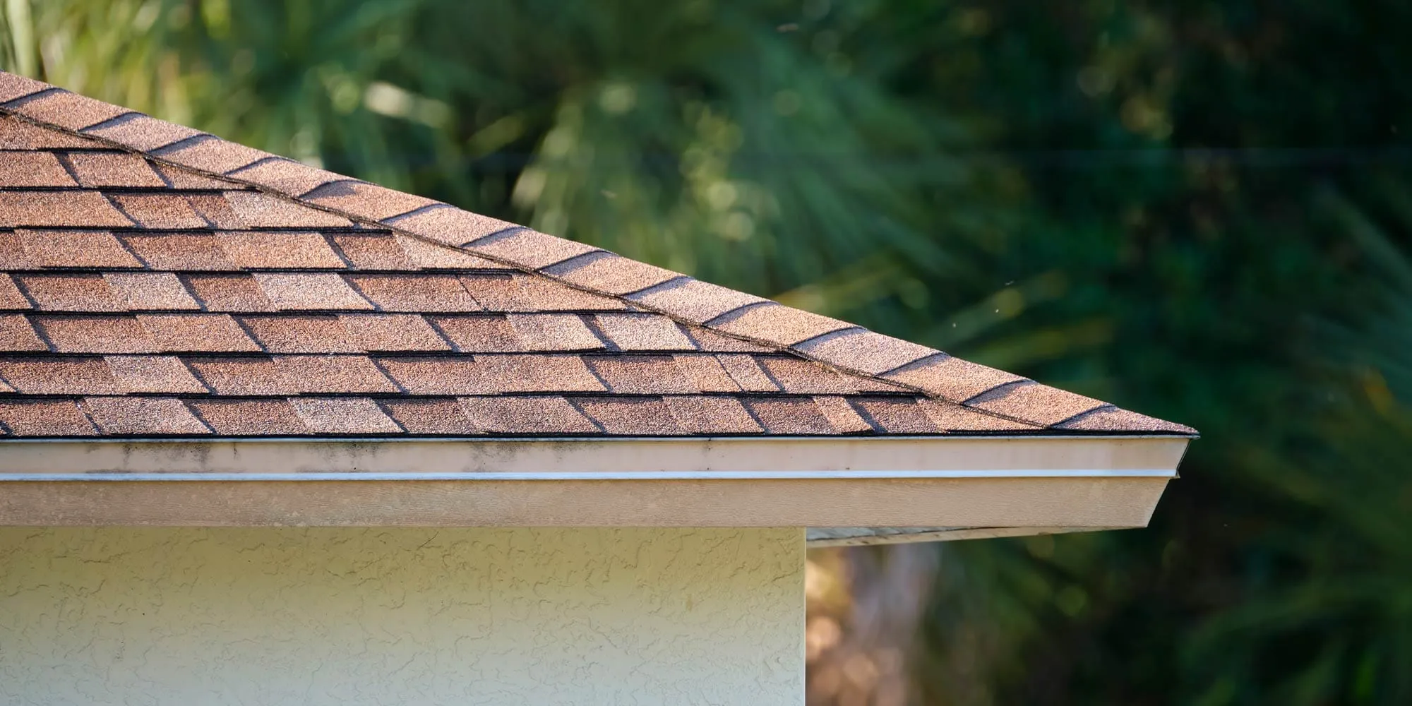 Asphalt shingle roofing close-up installation
